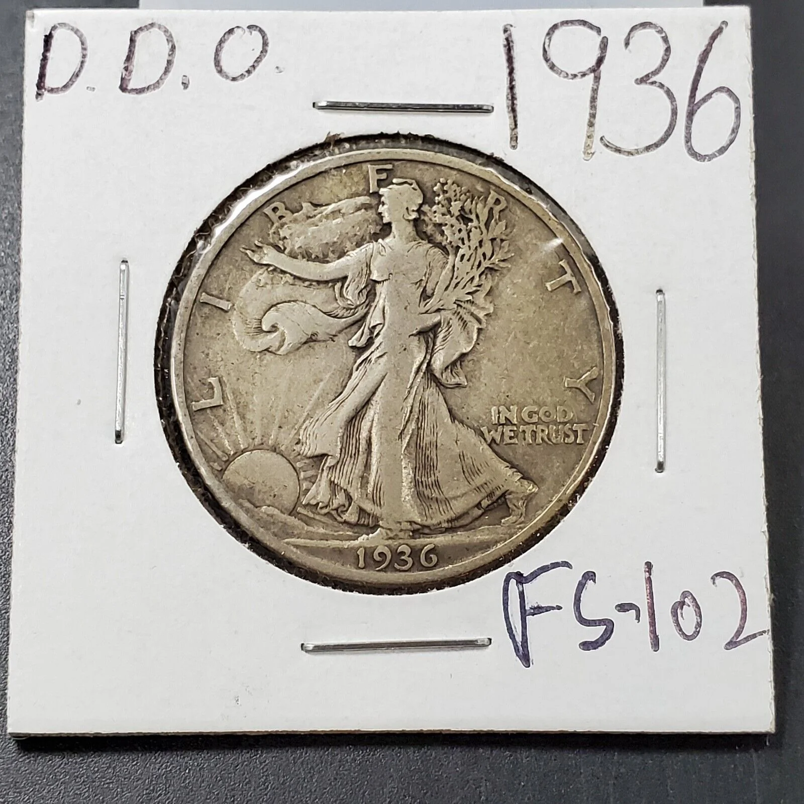 1936-P Walking Liberty Half Dollar DDO FS-102 showing doubling on Liberty's skirt folds and shoe details